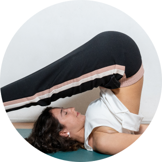 A female is performing yoga asana